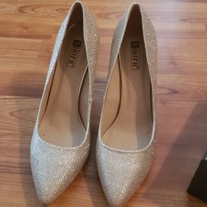 Gold sparkly high heels